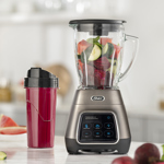 Licuadora Oster Jarra De Vidrio 1000W Con Vaso Blend And Go