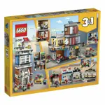 Set de construcción LEGO Creator 3 en 1 Townhouse Pet Shop & Café