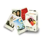 Cámara Instax Mini 12 Verde + Rollo Deco Sprinkles 10 fotos en caja exclusiva