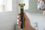 Afeitadora OneBlade Face & Body QP2824/10 - 45 Min, Seco/Húmedo, USB, 4 Peines